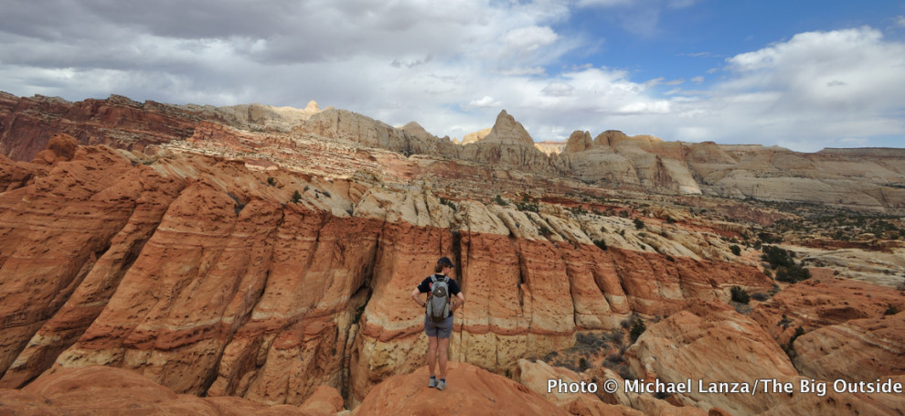Cap5-034c Penny hiking off-trail from Frying Pan Trail, Capitol Reef N.P., UT