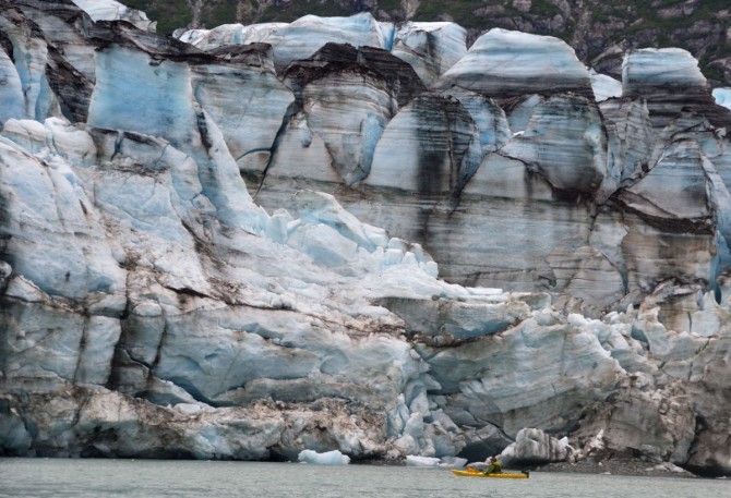 Kayaking past the Lamplugh Glacier in Glacier Bay.